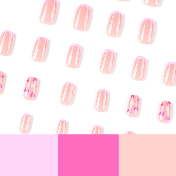 Elegant Nail Art with Heart Motifs Stornfield