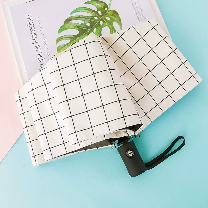 Women's Folding Umbrella with Elegant Feather Design Stornfield