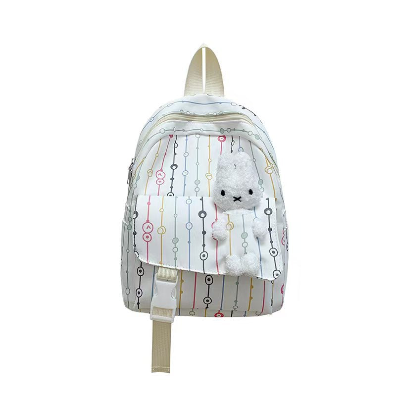 Backpack with Playful Checkered Pattern and Cute Plush Pendant Stornfield