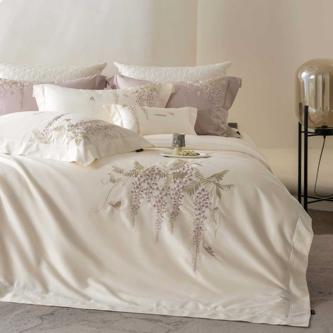 Satin bedding set with wisteria embroidery and fine piping