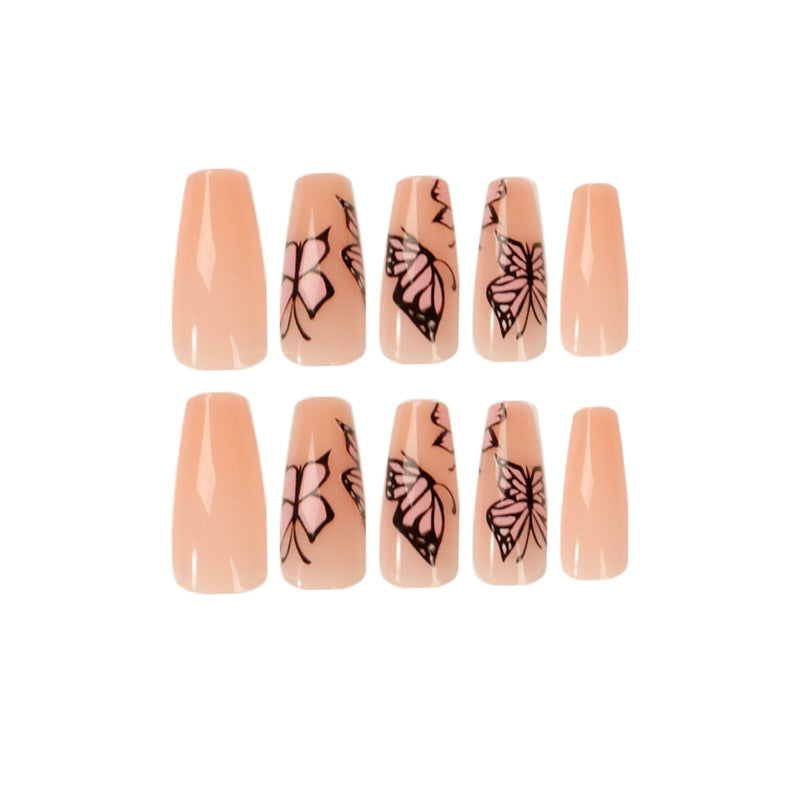 Artful acrylic nails with dynamic butterfly design Stornfield
