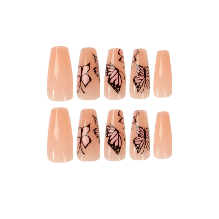Artful acrylic nails with dynamic butterfly design Stornfield