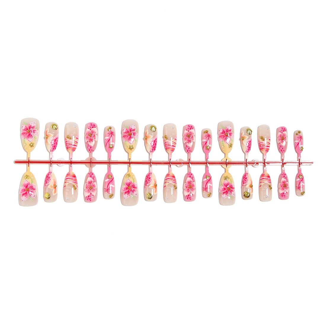 Artificial nails with floral embellishments and glitter accents Stornfield