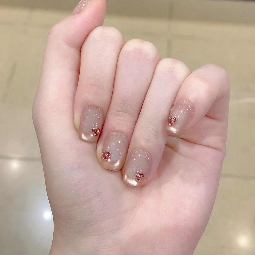Artificial nails with elegant glitter details Stornfield