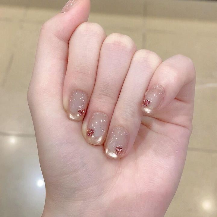 Artificial nails with elegant glitter details Stornfield
