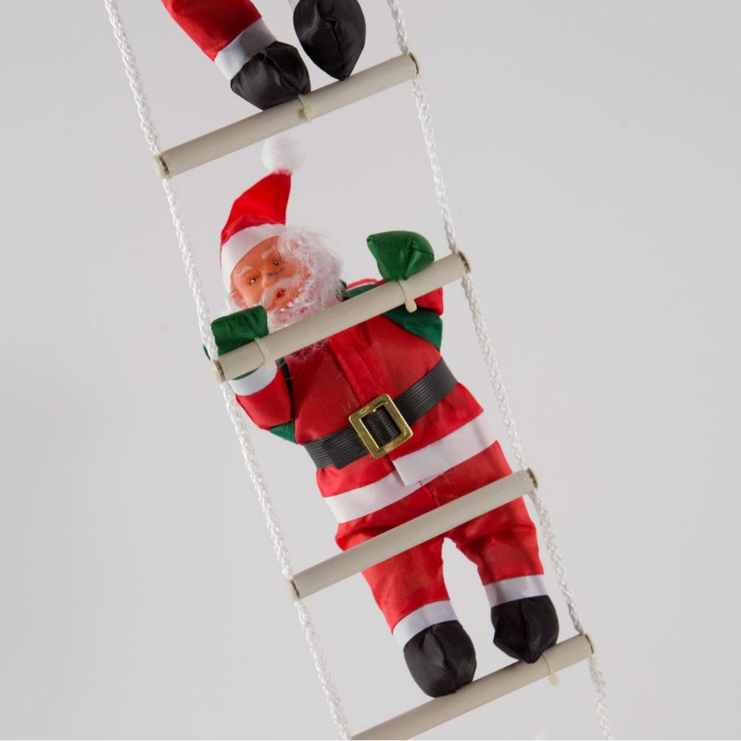Decorative Santa Claus figure on ladder