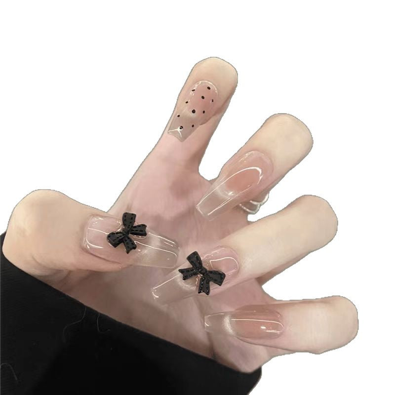 Trendy Press-On Nail Art Set with Stylish Bow Accents Stornfield