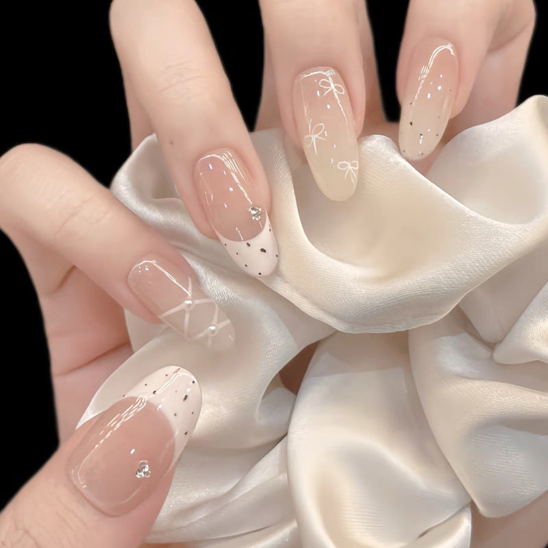 Elegant Press-On Nail Set with Artistic Detailing Stornfield