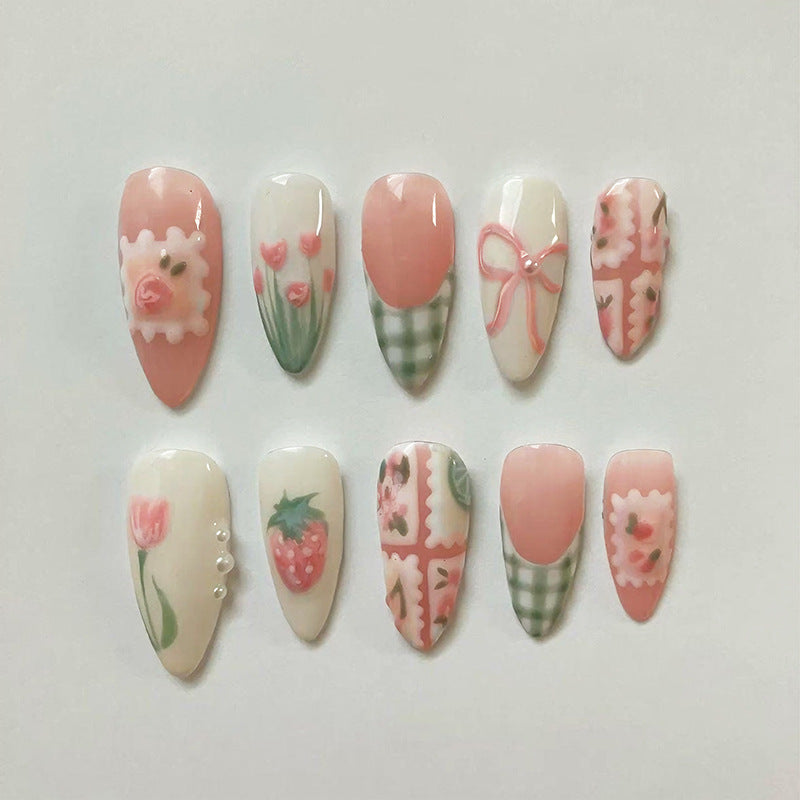 Artificial nail set with elegant floral and fashionable accents Stornfield