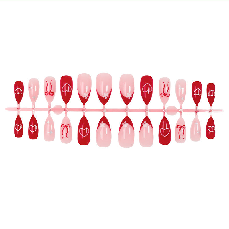 Artificial nail set with romantic hearts and bows Stornfield