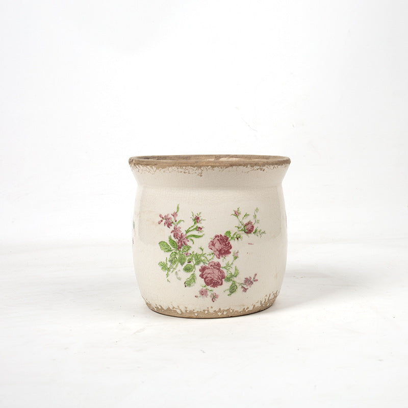 Decorative ceramic plant container with artistic design Stornfield