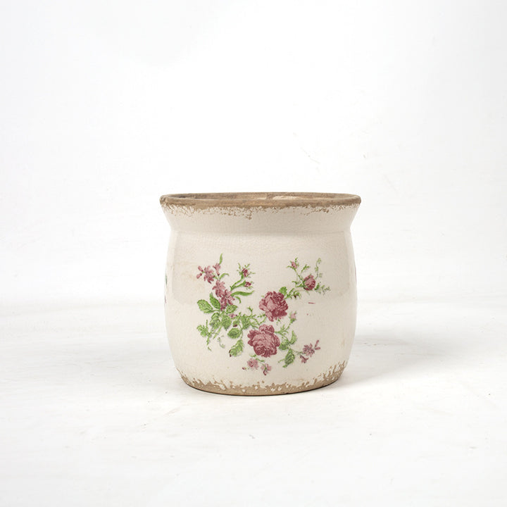 Decorative ceramic plant container with artistic design Stornfield