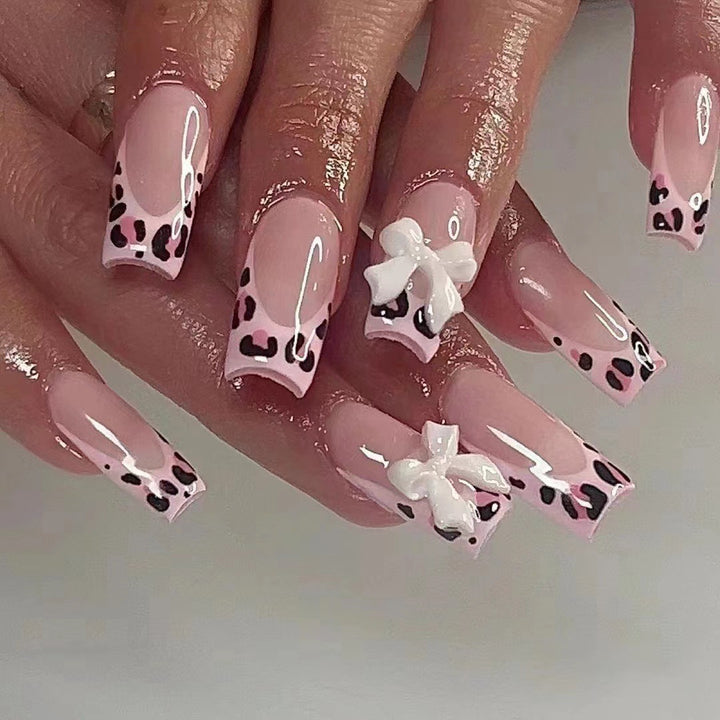 Artificial nails with leopard pattern and bows Stornfield