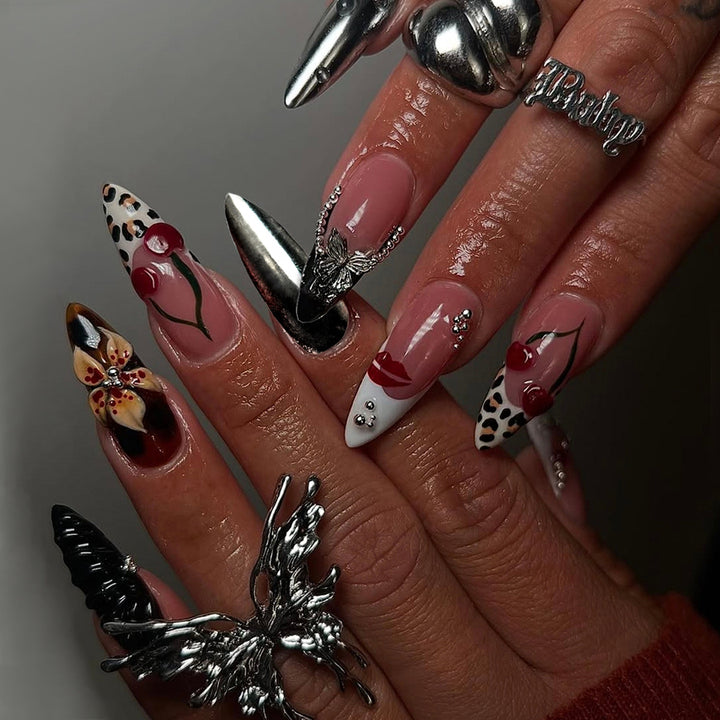 Artful Stiletto Fingernails with Unique Design Elements Stornfield