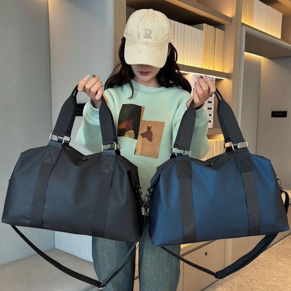 Athletic travel bag made of weather-resistant material with adjustable carrying handles Stornfield