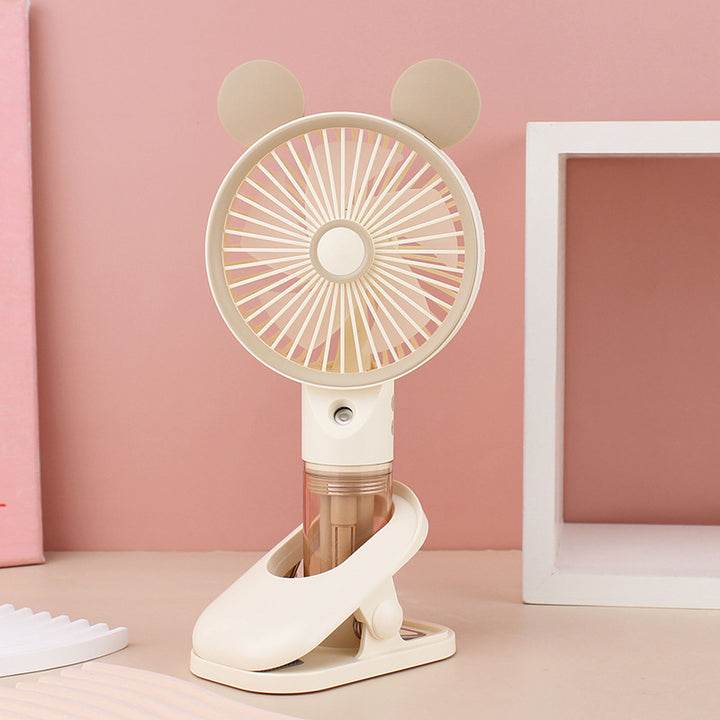 Cooling compact rechargeable clip-on misting handheld fan with detachable water reservoir and adjustable tilt Stornfield