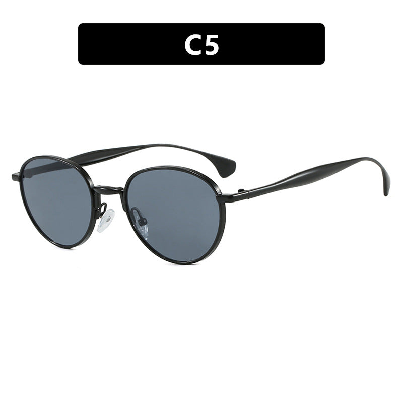 Women's round sunglasses with elegant metal frame and UV protection Stornfield