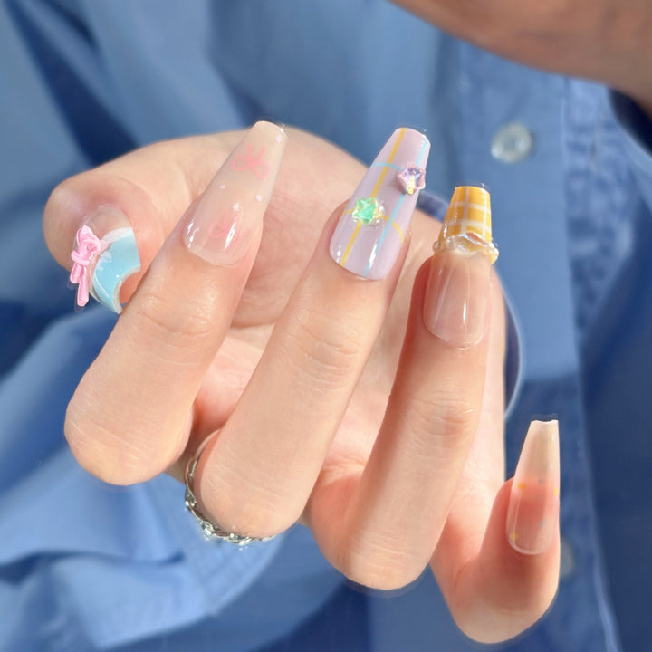 Artistic Press-On Nail Set with Whimsical Designs Stornfield