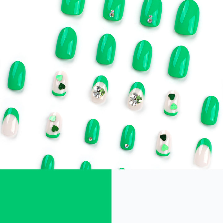 Artistic Nail Extensions with Lovable Heart Patterns and Glitter Accents Stornfield