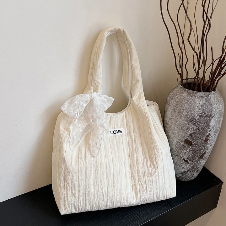 Leisure bag with structured design and playful scarf Stornfield