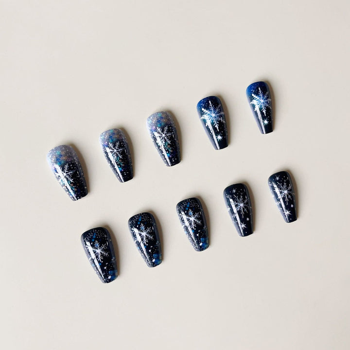 Nail art set with sparkling snowflakes and glitter accents Stornfield
