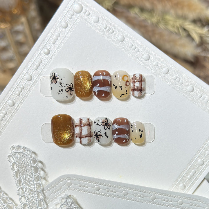 Artistic Press-On Nail Set with Unique Design Elements Stornfield