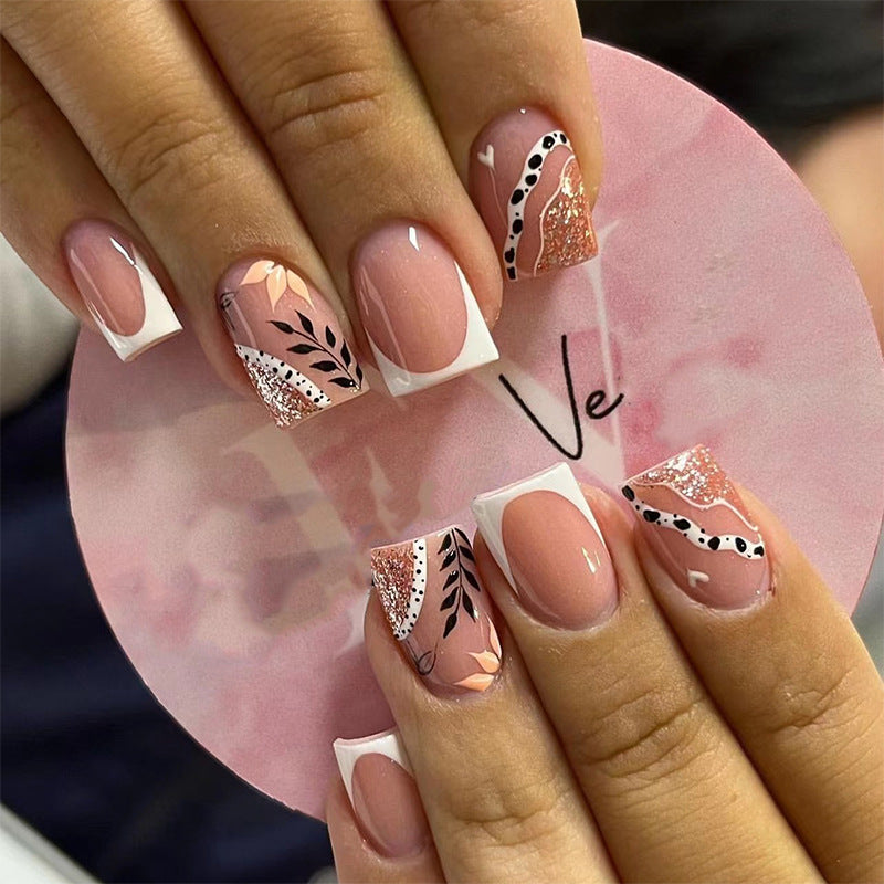 Trendy artificial nails in flower and glitter pattern Stornfield