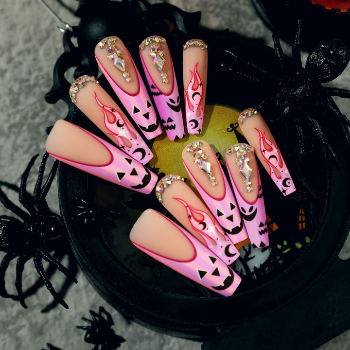 Artificial nail art with festive design and glitter variations Stornfield
