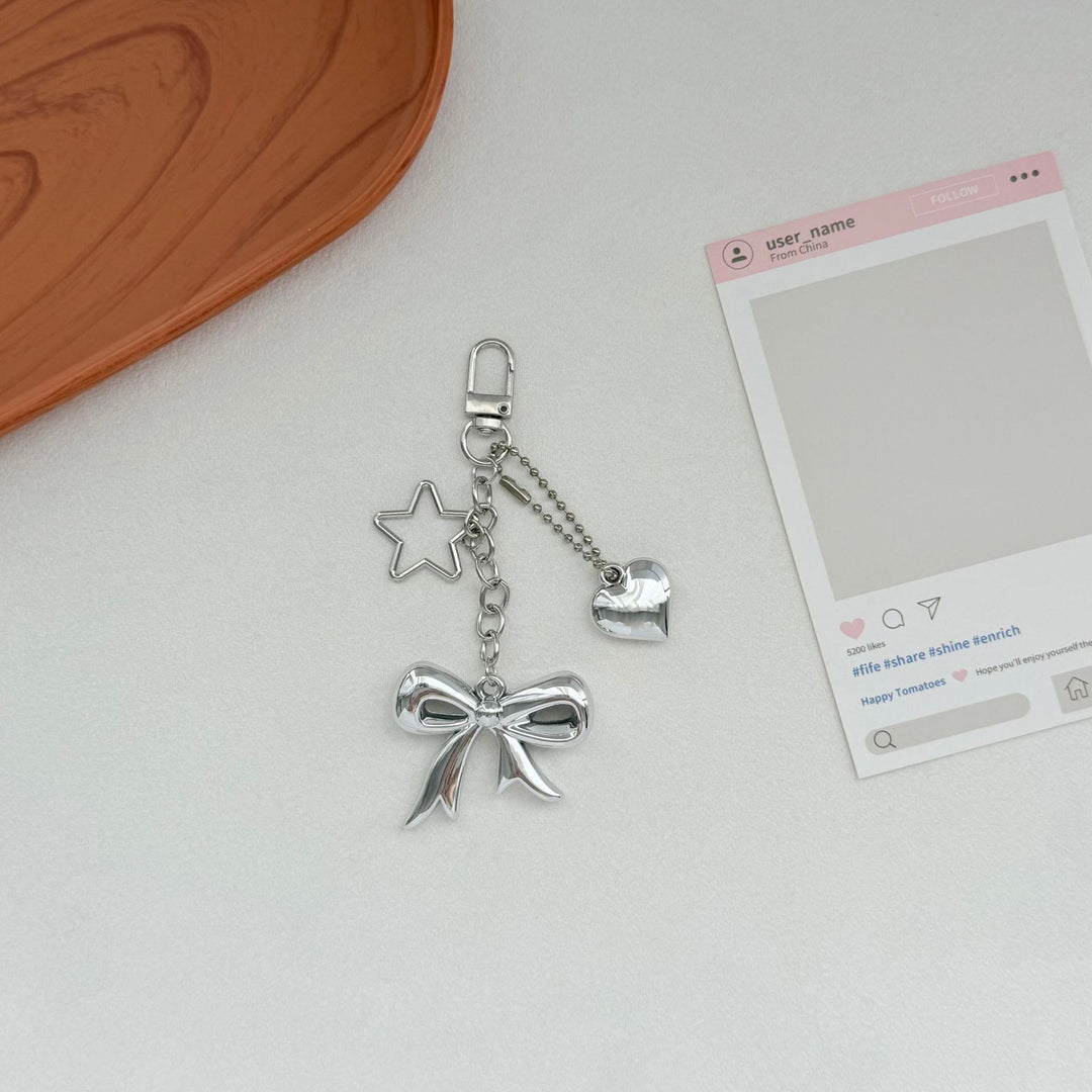 Playful Bow and Star Keychain Stornfield