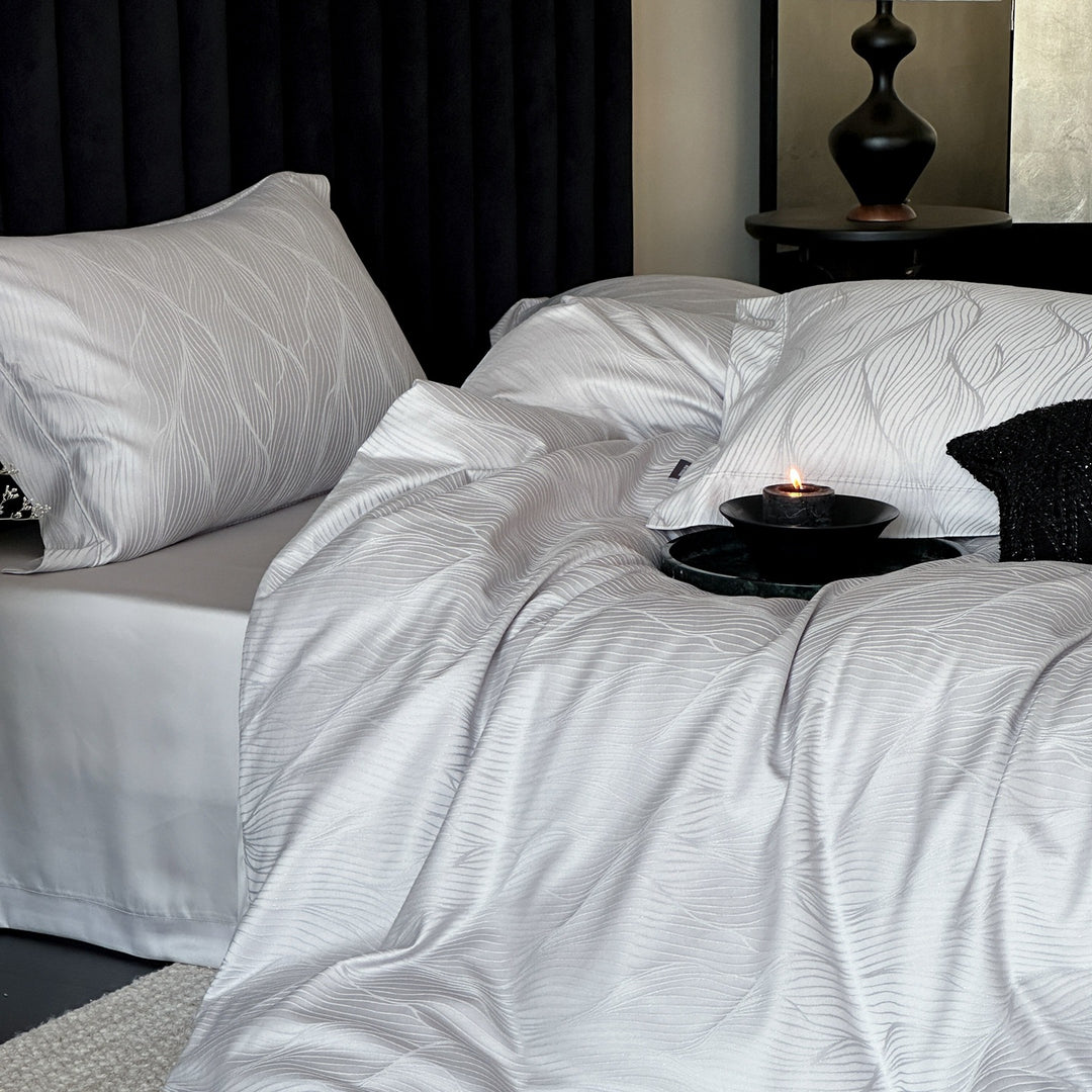 Luxurious satin jacquard bedding with floral relief pattern