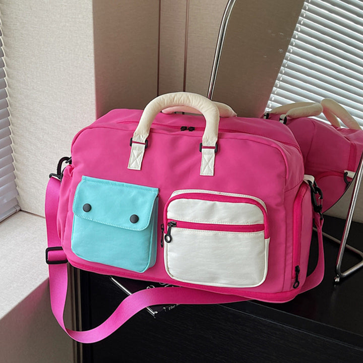 Sporty travel bag with multifunctional outer pockets Stornfield
