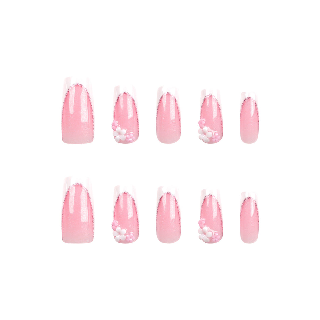 Artful Nail Extensions with Glitter and Flower Accents Stornfield