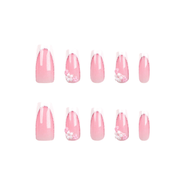 Artful Nail Extensions with Glitter and Flower Accents Stornfield