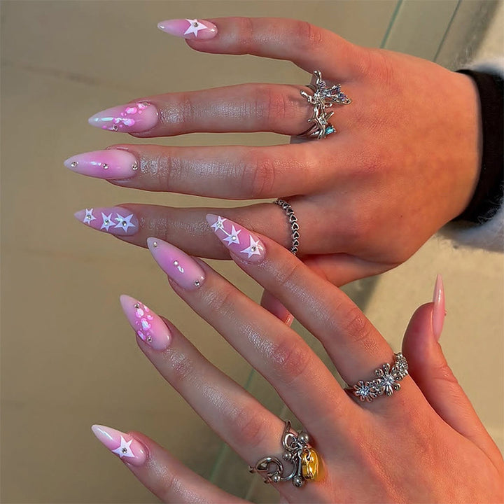 Artificial nail set with sparkling rhinestone accents and playful star motifs Stornfield