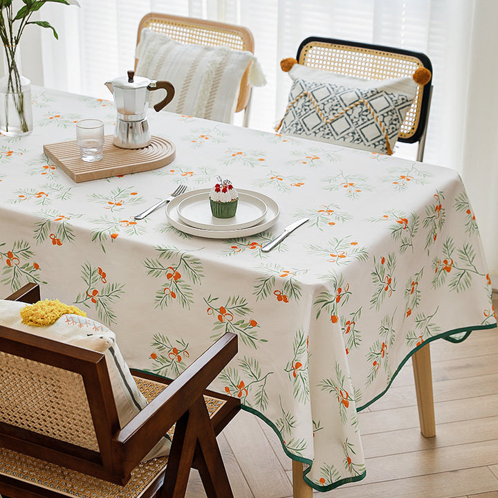 Rectangular tablecloth with botanical orange berry print and contrasting hem piping Stornfield