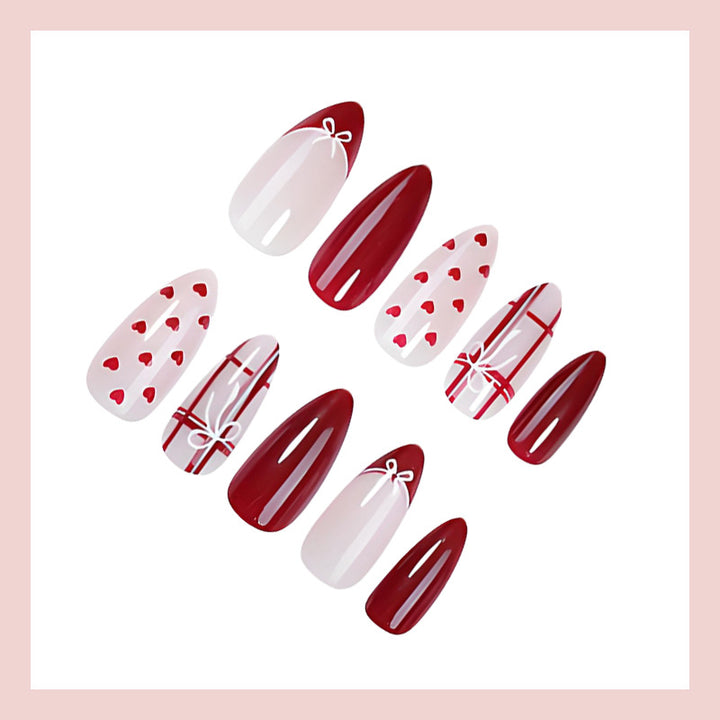 Nail set with playful hearts and elegant bows Stornfield