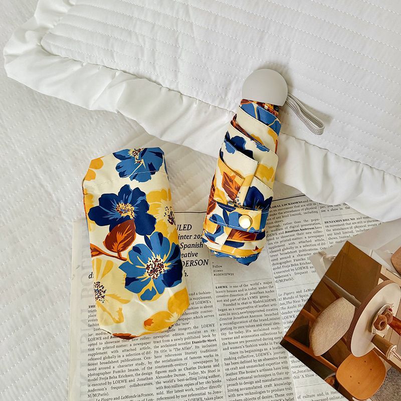 Women Folding Umbrella with Detailed Floral Design Stornfield