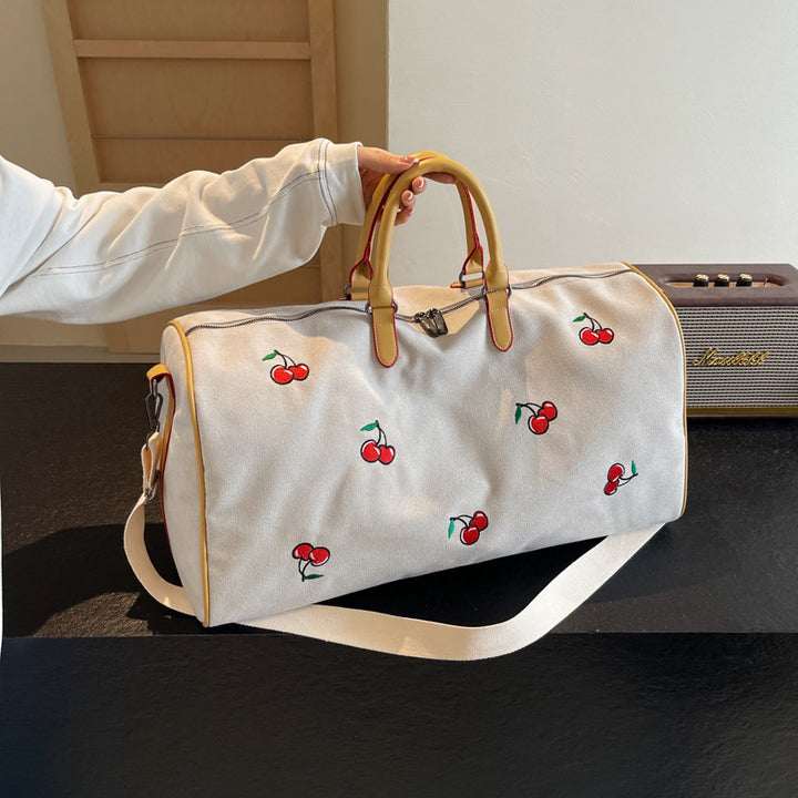 Sporty weekend bag with playful cherry pattern Stornfield