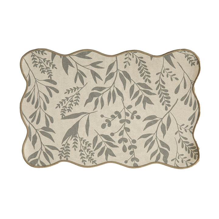 Shaped table set with curved contour and botanical leaf pattern Stornfield