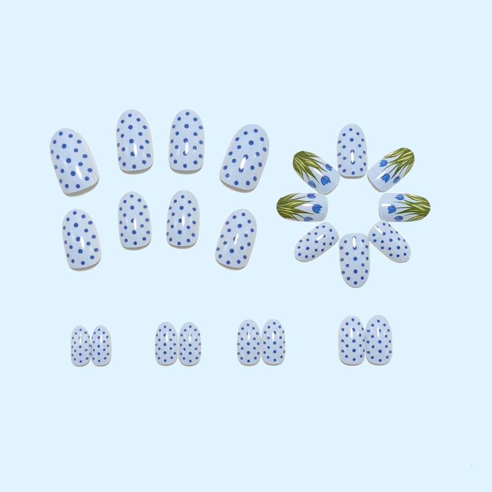 Creative art nails in an elegant polka dot design with floral accents Stornfield