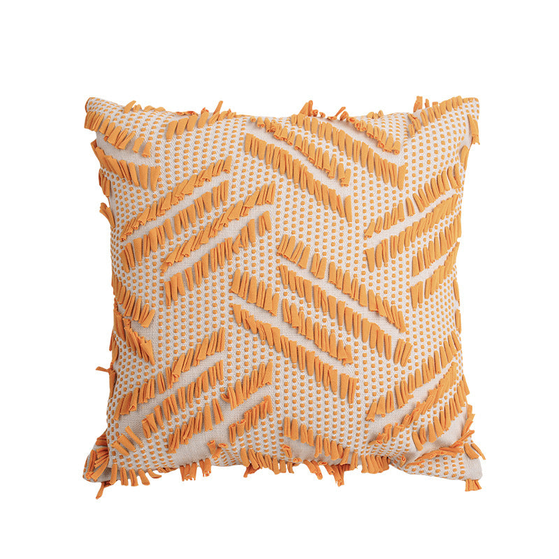 Decorative pillow with woven chenille relief structure and fringe application Stornfield