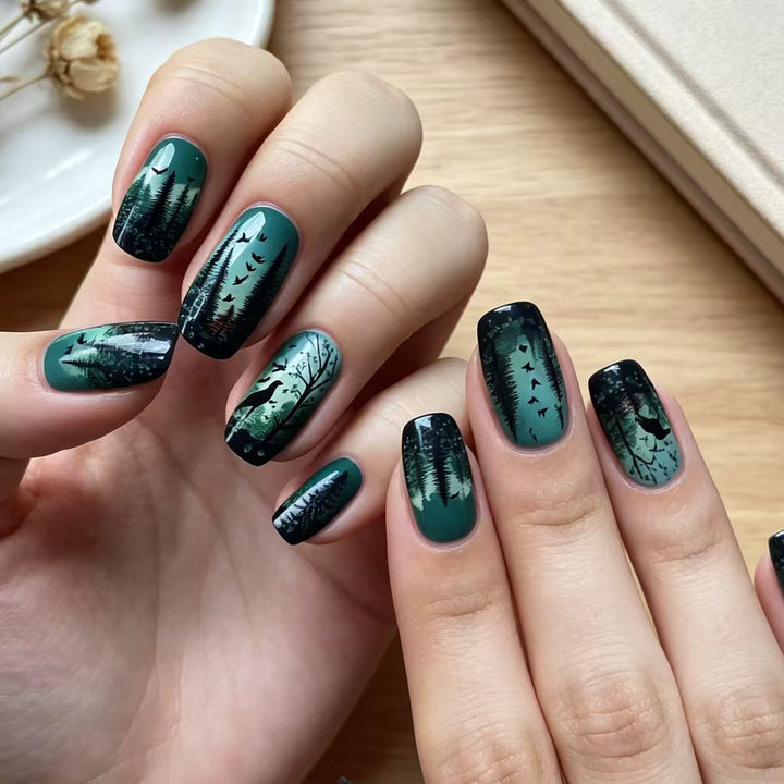 Art nails with creative forest scene design Stornfield