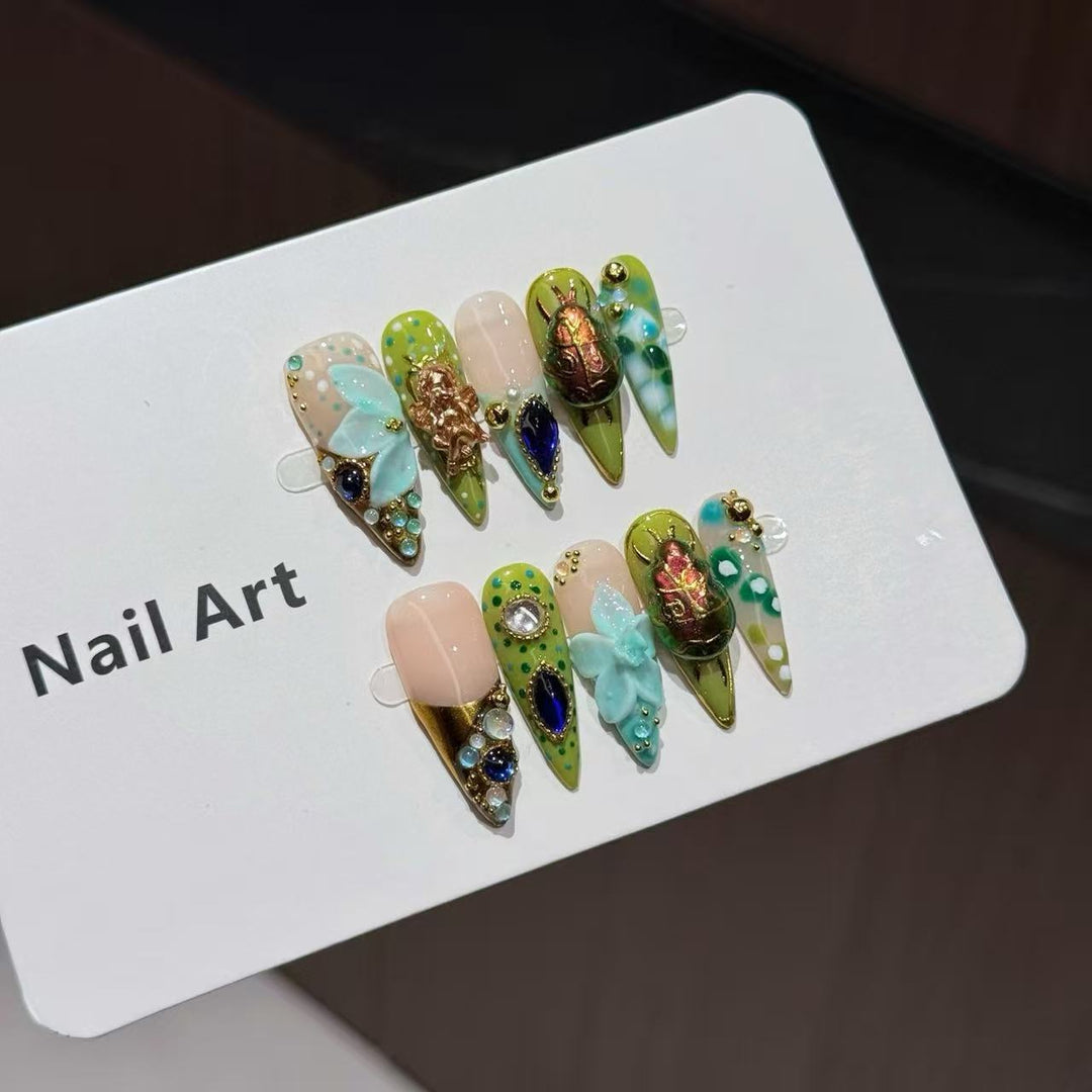 Artistic Nail Art Set with Floral and Gemstone Accents