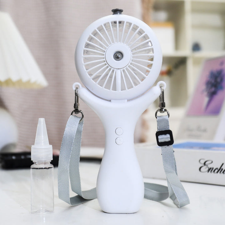 Women portable mini hand fan with spray function and ergonomic design Stornfield