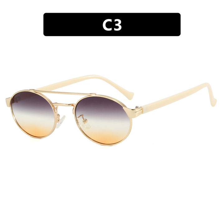Ladies fashionable sunglasses in stylish round design with golden accents Stornfield