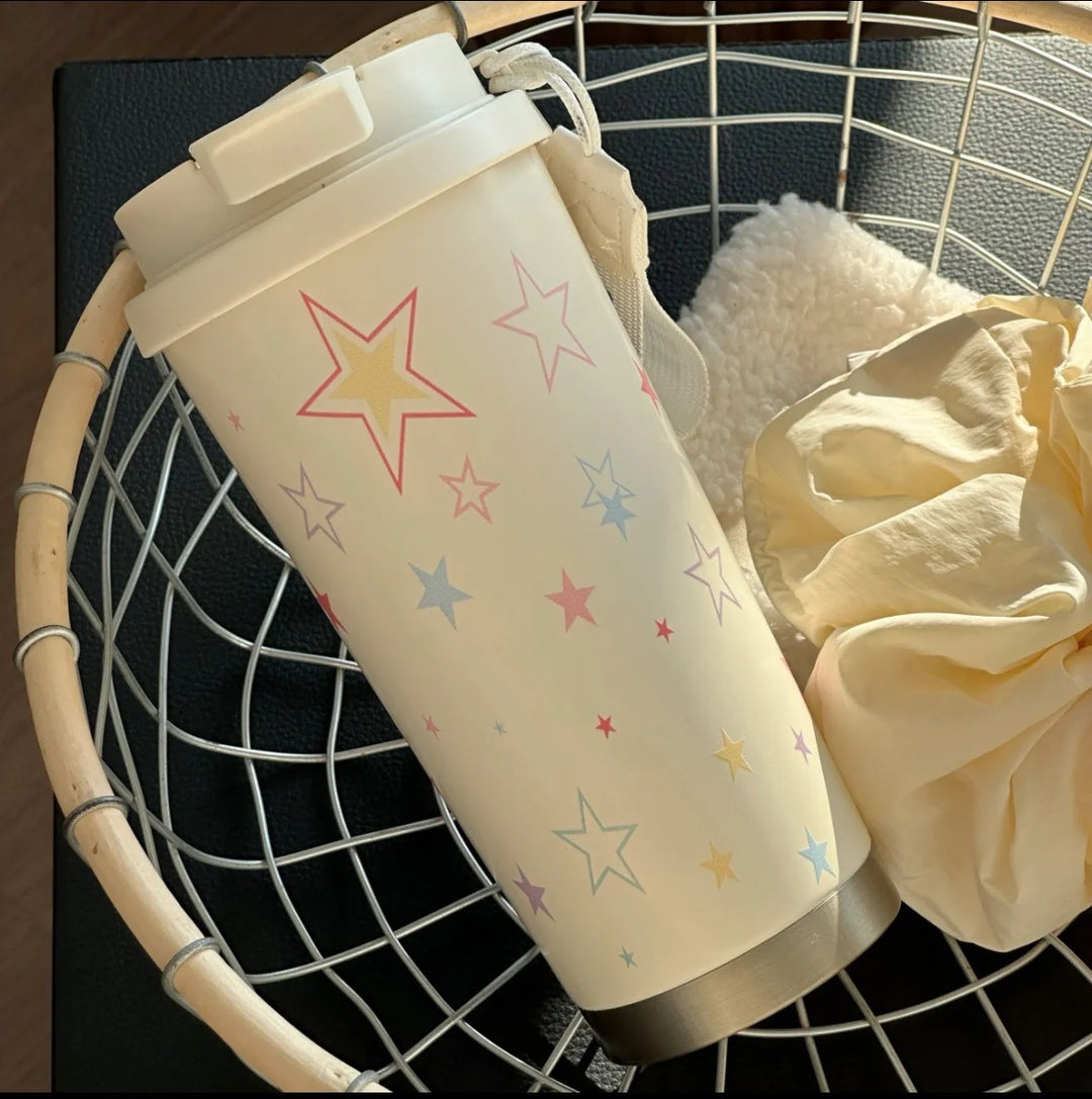 Women's insulated mug with practical carrying handle and charming Hello Kitty design Stornfield