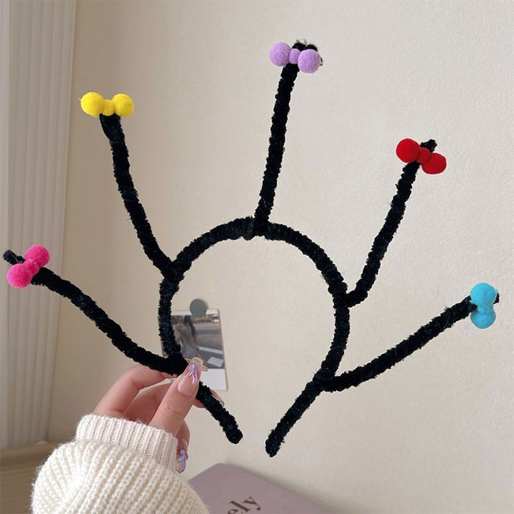 Playful Pom-Pom Headband Stornfield