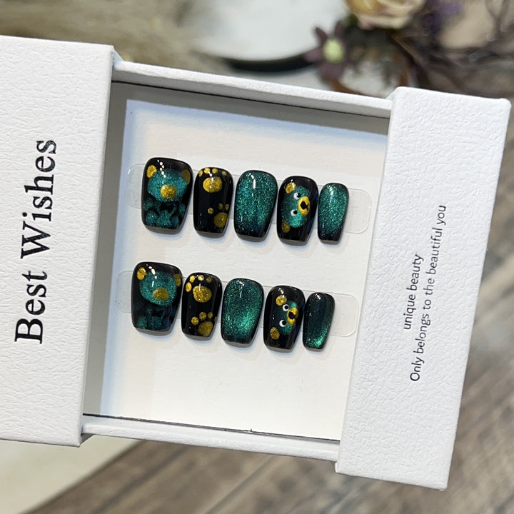 Artistic Press-On Nail Set with Playful Floral and Glitter Accents Stornfield