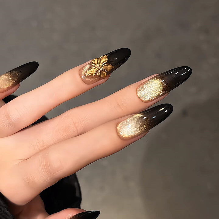Glamorous artificial nails with intricate flower and glitter effects Stornfield