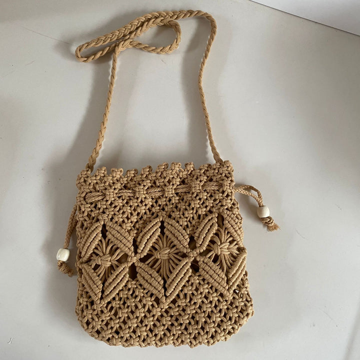 Hand-knotted shoulder bag with floral details Stornfield